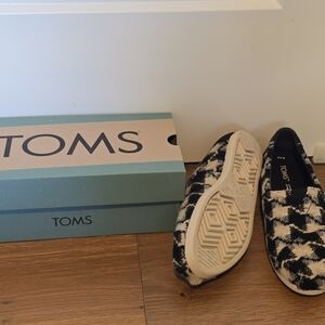 TOMS Black and White Slip-On Shoes
